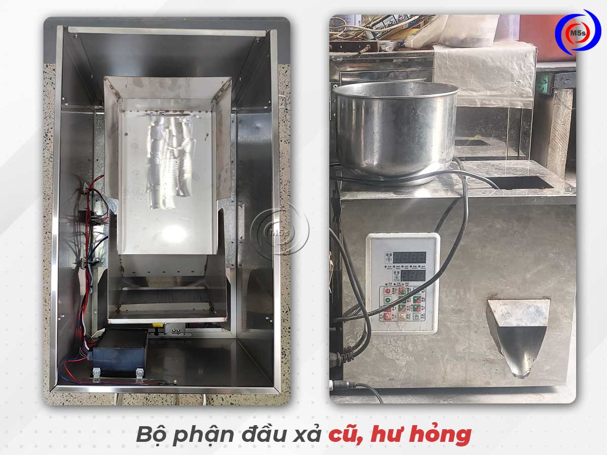 bộ phận xả máy cân định lượng cũ, hư hỏng
