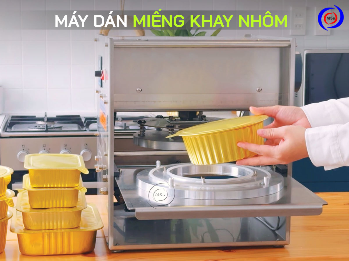máy dán miệng khay nhôm