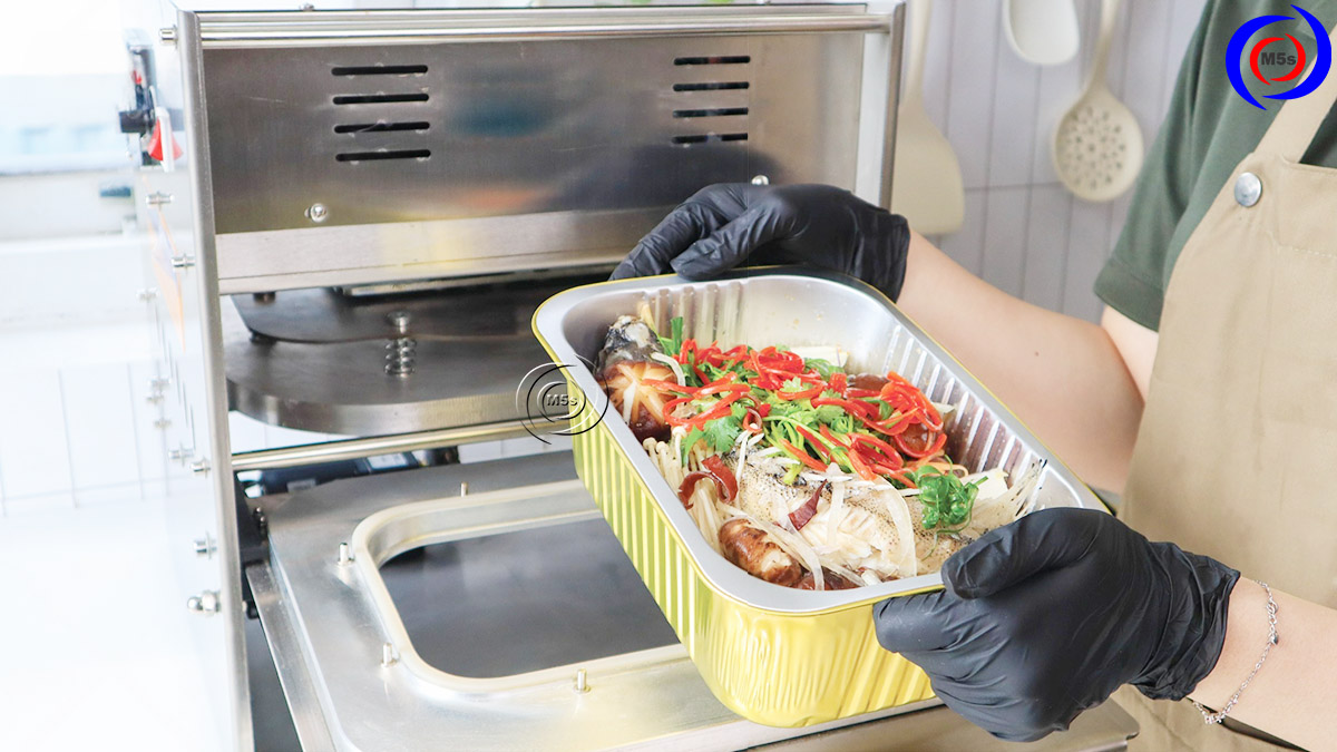 Thực tế máy dán miệng khay nhôm KN-1 Thực tế máy dán miệng khay nhôm KN-1