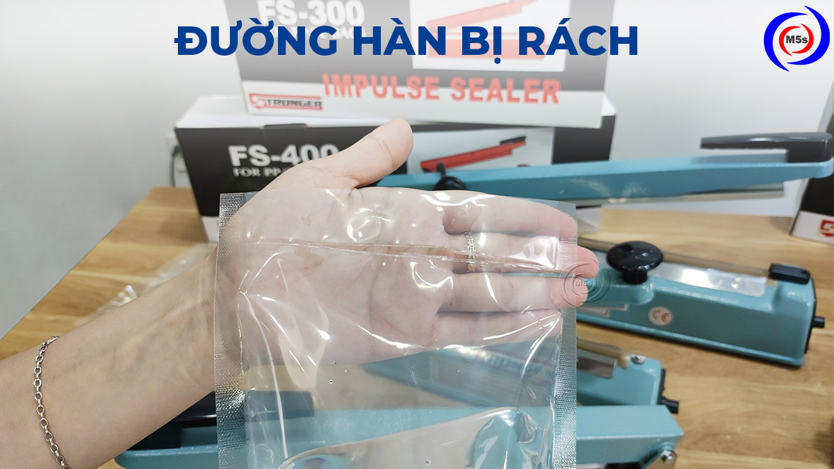 đường hàn miệng túi bị rách đường hàn miệng túi bị rách