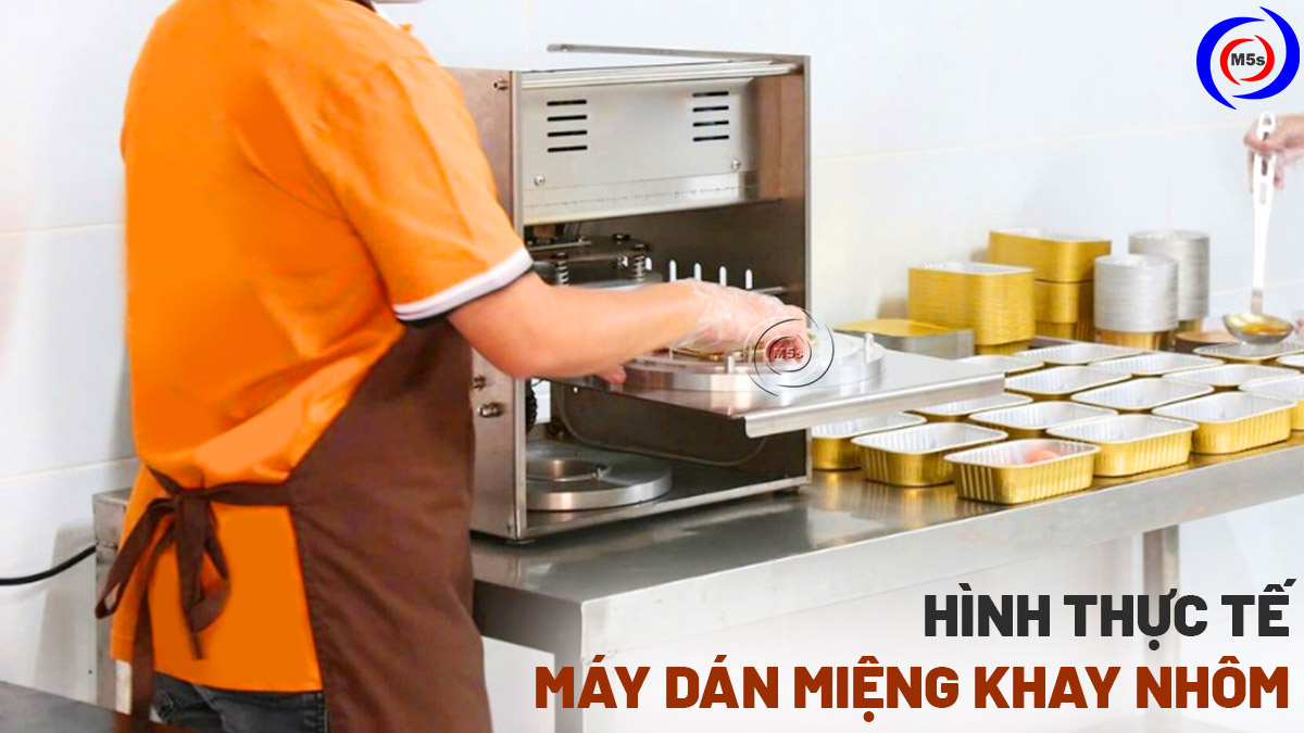 Hình thực tế máy dán miệng khay nhôm Hình thực tế máy dán miệng khay nhôm