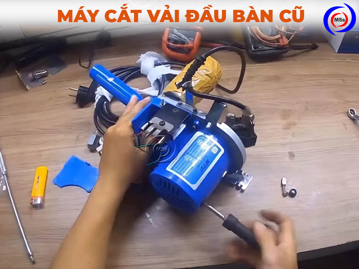 sửa chữa máy cắt vải đầu bàn cũ