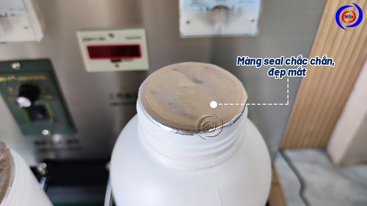 thành phẩm dán màng seal chai đẹp thành phẩm dán màng seal chai đẹp